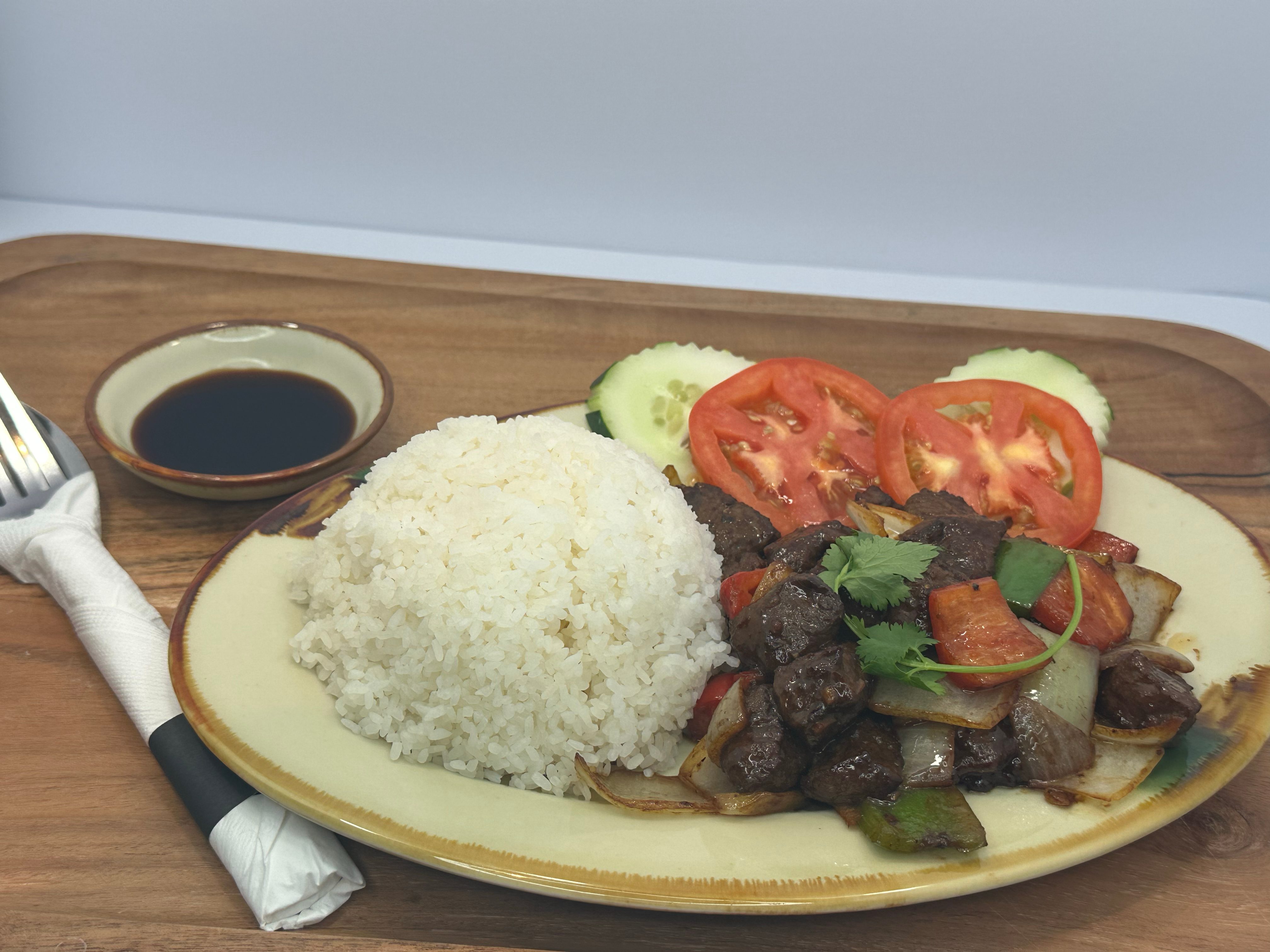 31 Shaking Beef with Rice.